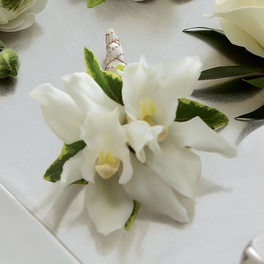 White Mini Cymbidium Boutonniere –  Rosasxyasmin, Phoenix AZ